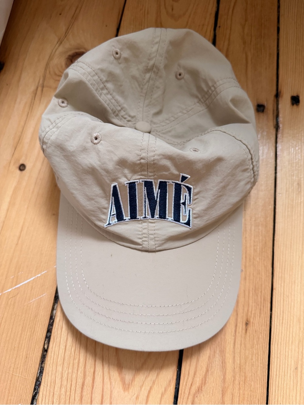 Aime Leon Dore Beige Baseball Cap with Navy Embroidered Logo
